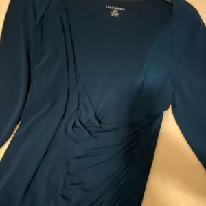 Teal dress top. Pretty with or without a jacket.
